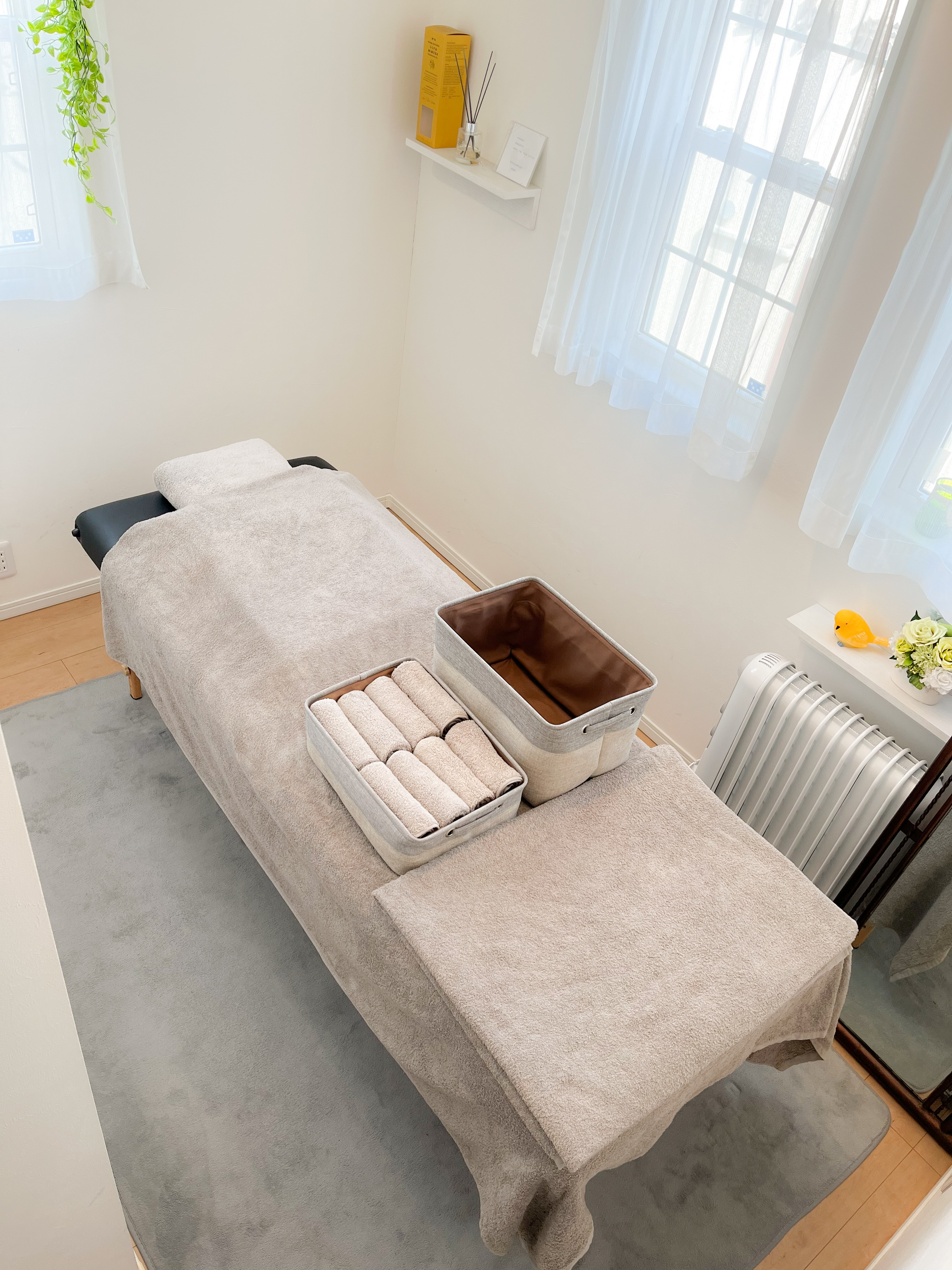 Massage bed prepared with towels